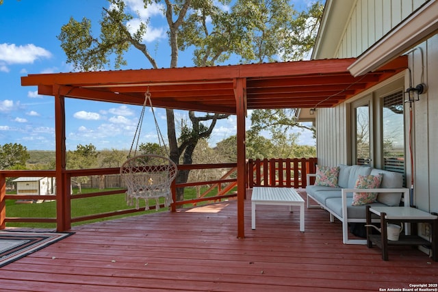 wooden terrace featuring an outdoor hangout area