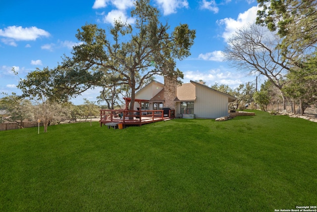 view of yard featuring a deck