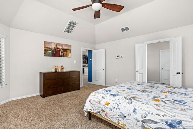 bedroom featuring visible vents, light carpet, baseboards, and vaulted ceiling