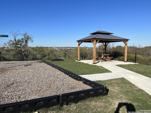 view of yard featuring a gazebo, fence, and a patio area