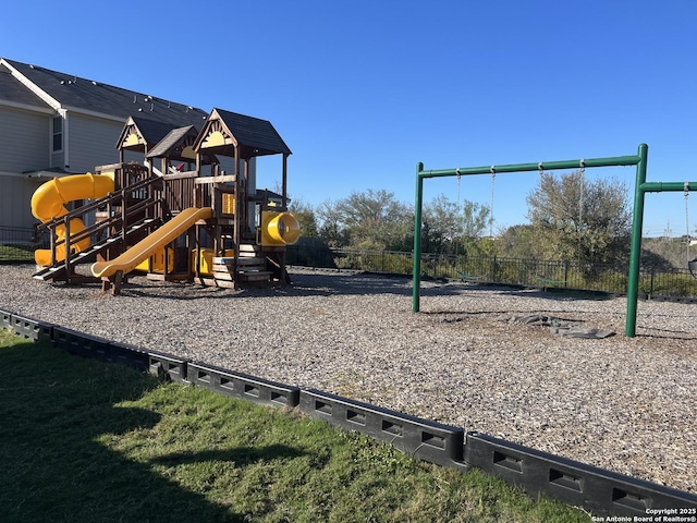 community playground featuring fence