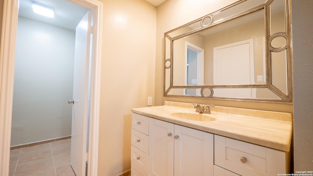 bathroom featuring tile patterned floors and vanity