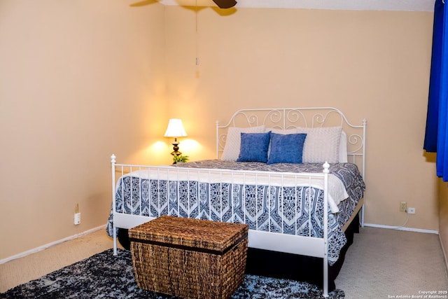 bedroom featuring carpet flooring and baseboards