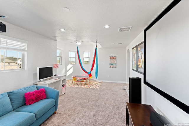 game room featuring baseboards, visible vents, carpet floors, recessed lighting, and a textured ceiling