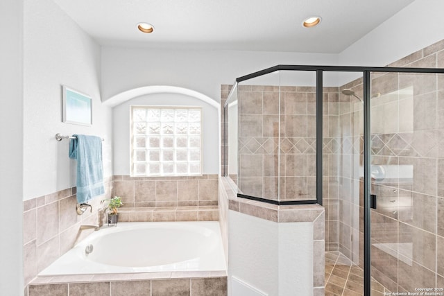 full bath featuring a bath, recessed lighting, and a stall shower