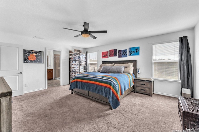 bedroom with visible vents, ceiling fan, baseboards, and carpet