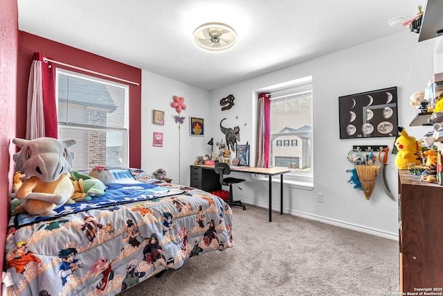 carpeted bedroom with multiple windows and baseboards