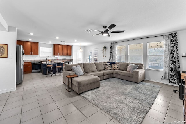 living area featuring visible vents, recessed lighting, light tile patterned floors, baseboards, and ceiling fan