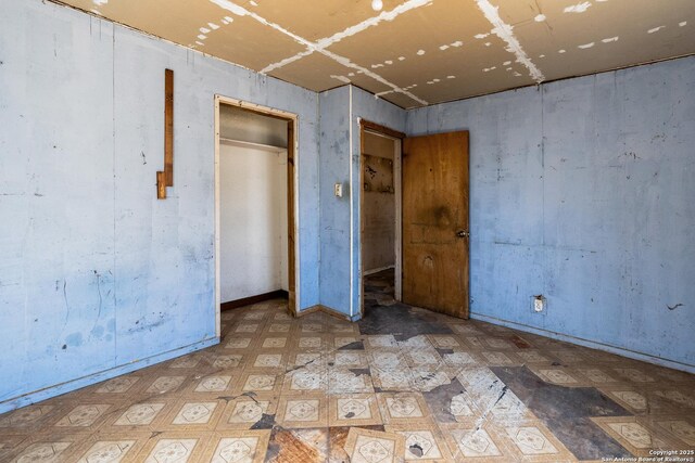 unfurnished bedroom with tile patterned floors