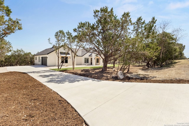 view of front of house with an attached garage and driveway