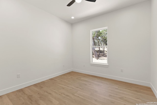 unfurnished room featuring recessed lighting, baseboards, light wood-style floors, and a ceiling fan