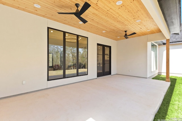 view of patio / terrace featuring french doors and ceiling fan