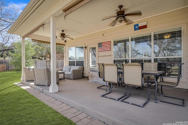 view of patio featuring outdoor dining space, an outdoor living space, a ceiling fan, and fence