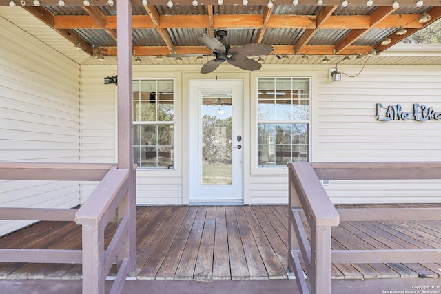 entrance to property featuring ceiling fan