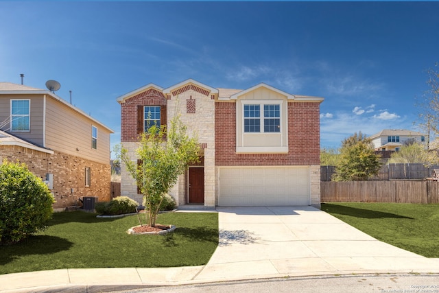 traditional-style home with driveway, fence, a front yard, an attached garage, and brick siding