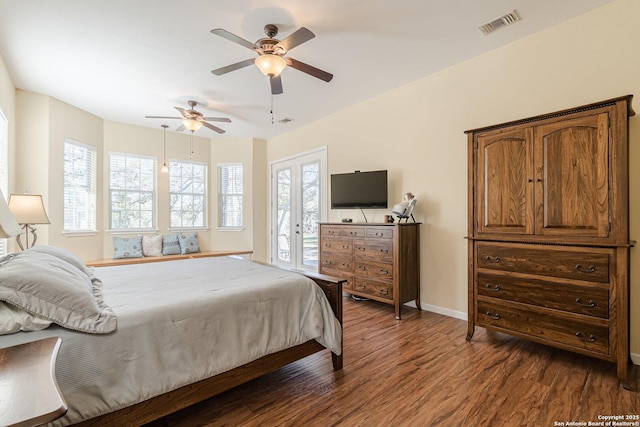 bedroom with visible vents, dark wood-type flooring, access to outside, baseboards, and ceiling fan