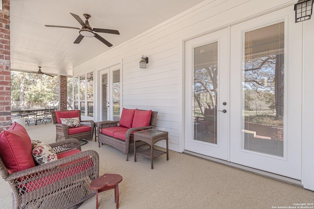 view of patio with french doors, ceiling fan, and outdoor lounge area