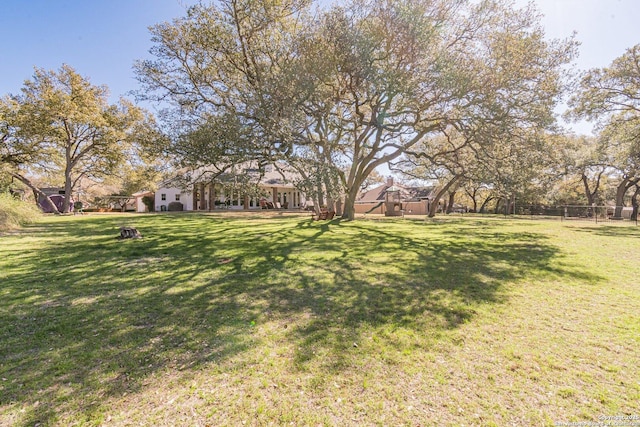 view of yard with fence