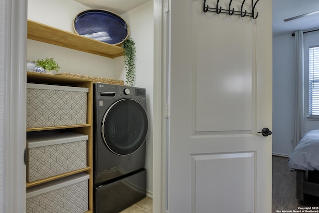 laundry room with washer / dryer and laundry area