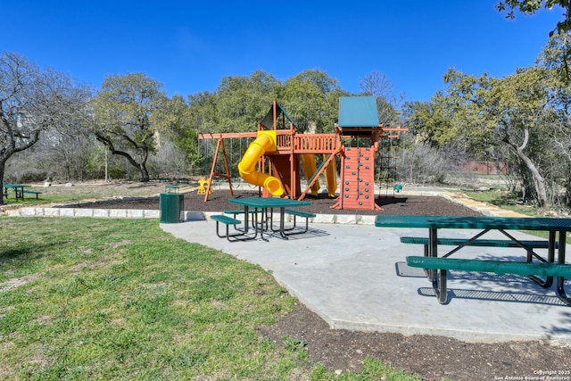 community playground with a lawn