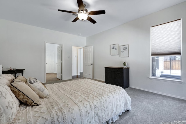 bedroom with ceiling fan, baseboards, and carpet