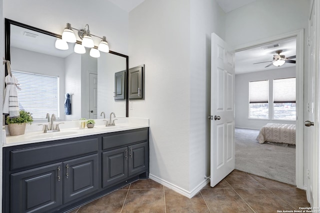 bathroom featuring a sink, visible vents, and tile patterned floors