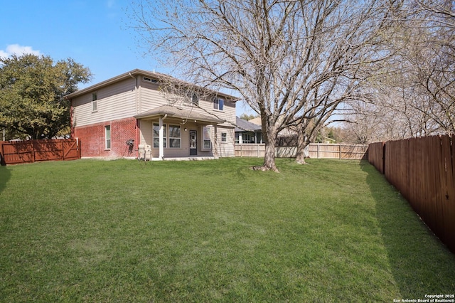 view of yard featuring a fenced backyard