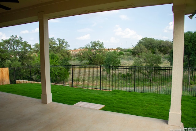 view of yard featuring a patio area and fence