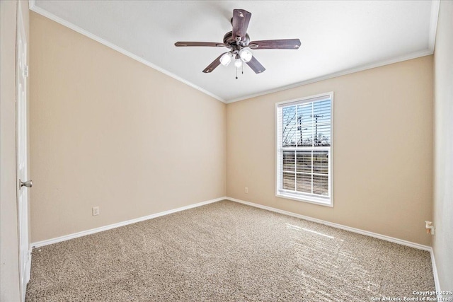 unfurnished room featuring baseboards, carpet floors, ornamental molding, and a ceiling fan