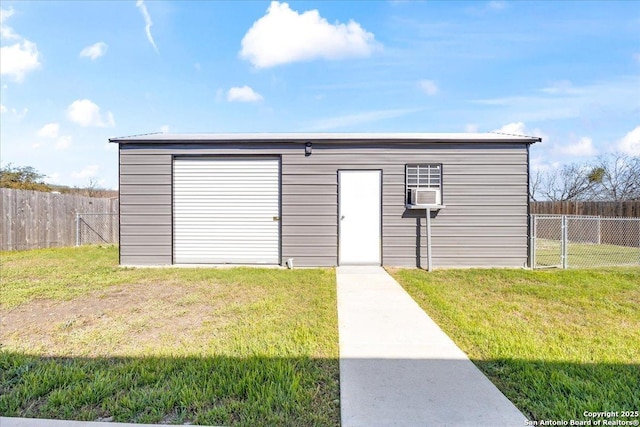 garage featuring fence