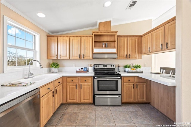 kitchen featuring visible vents, ornamental molding, stainless steel appliances, light countertops, and exhaust hood