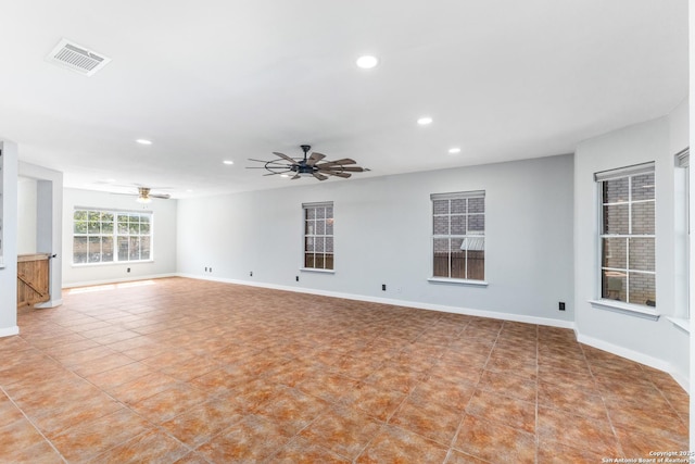 tiled spare room featuring baseboards, recessed lighting, visible vents, and ceiling fan