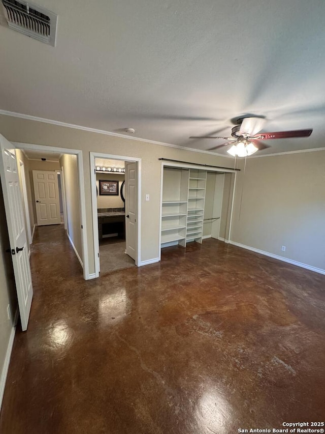 unfurnished bedroom with visible vents, finished concrete flooring, ceiling fan, baseboards, and ornamental molding