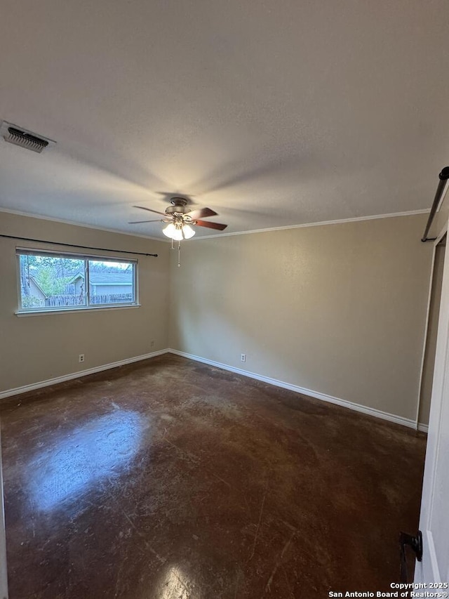 empty room with ceiling fan, baseboards, visible vents, and finished concrete floors