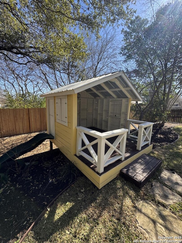 view of poultry coop featuring a fenced backyard