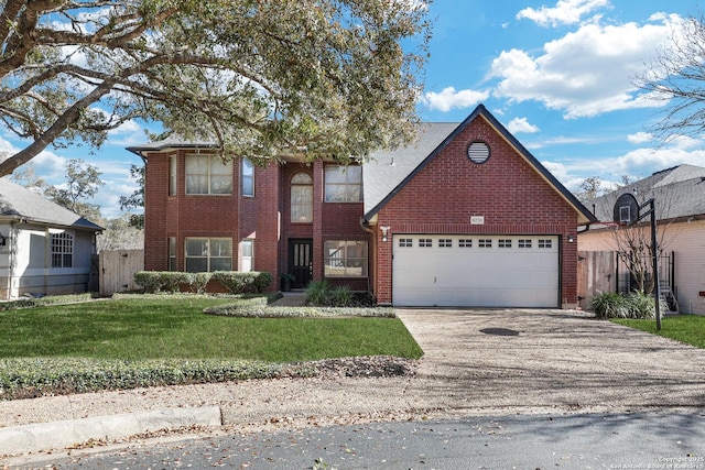 traditional-style home with a garage, brick siding, driveway, and fence