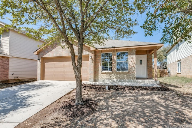 single story home featuring an attached garage and driveway