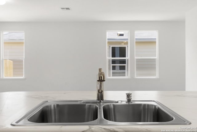 13210 Club House Blvd, San Antonio, TX 78221 - kitchen view of a sink and light stone countertops
