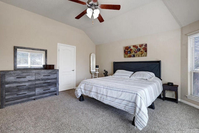 bedroom with ceiling fan, carpet, and lofted ceiling