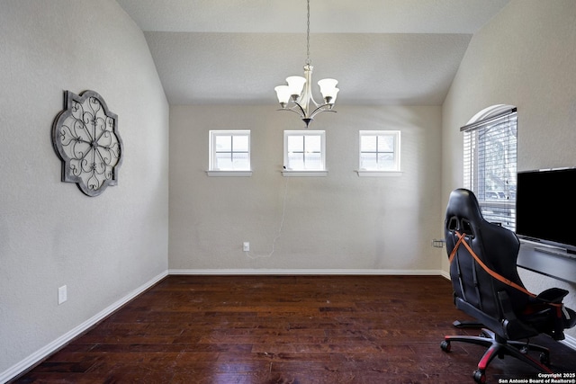 office featuring vaulted ceiling, wood finished floors, and baseboards