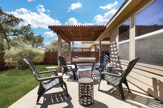 view of patio / terrace with a pergola and a fenced backyard