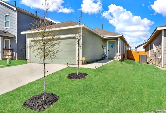 view of front facade featuring cooling unit, fence, an attached garage, a front lawn, and concrete driveway