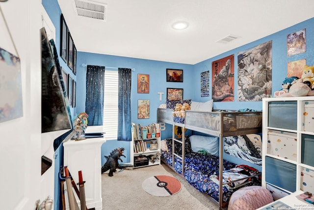 carpeted bedroom with visible vents