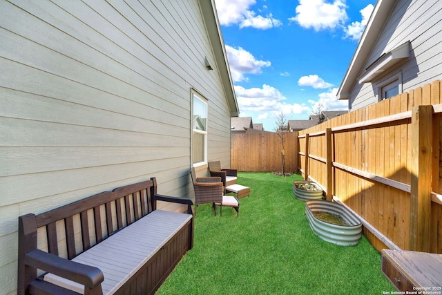 view of yard featuring fence