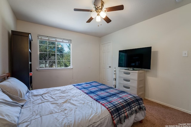 bedroom featuring carpet flooring and a ceiling fan