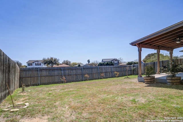 view of yard featuring a fenced backyard