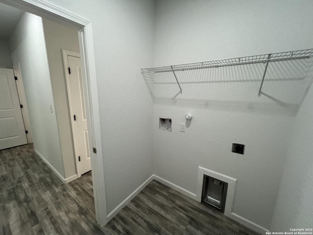 laundry area with laundry area, dark wood-style floors, gas dryer hookup, and electric dryer hookup