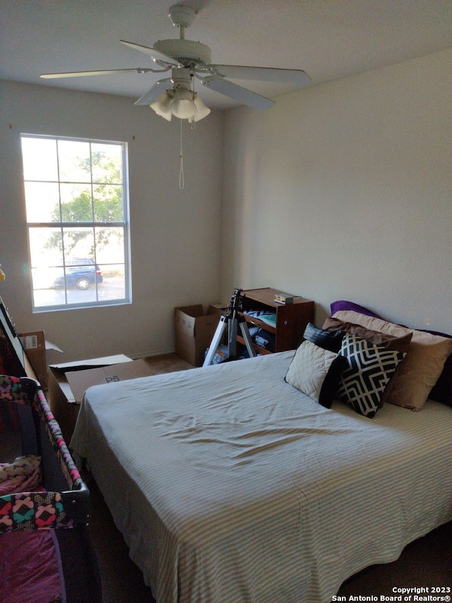 bedroom featuring ceiling fan