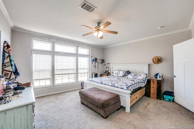 bedroom featuring visible vents, ornamental molding, a ceiling fan, baseboards, and light colored carpet