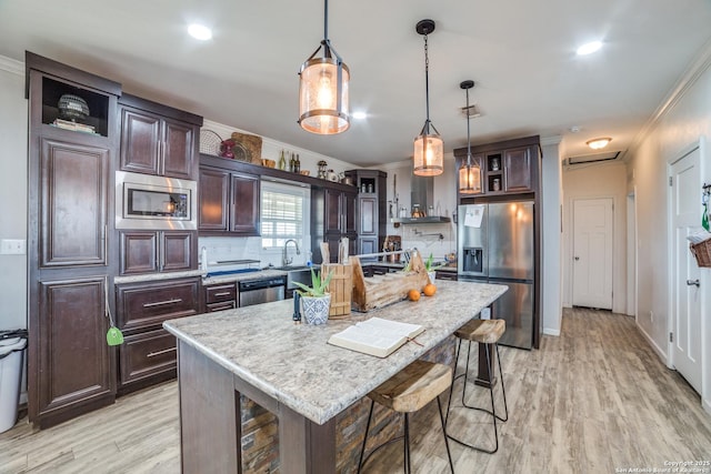 kitchen featuring open shelves, ornamental molding, and stainless steel appliances